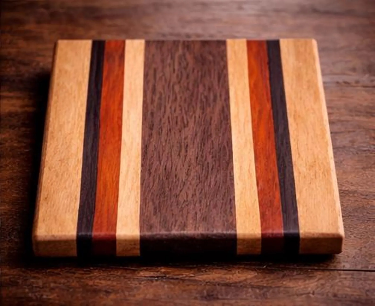 Exotic hardwood coaster on the bench with Trade Up branding