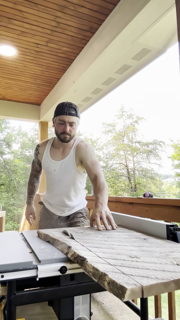 Ripping a hardwood board on the table saw