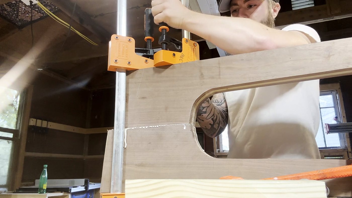 A clamped panel with a shaped opening being cleaned up